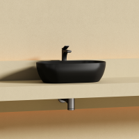 Раковина CERAMICANOVA Twist накладная овальной формы 500x300x140 черный матовый CN12001MB - Gidratop.ru изображение