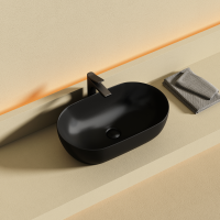 Раковина CERAMICANOVA Twist накладная овальной формы 500x300x140 черный матовый CN12001MB - Gidratop.ru изображение